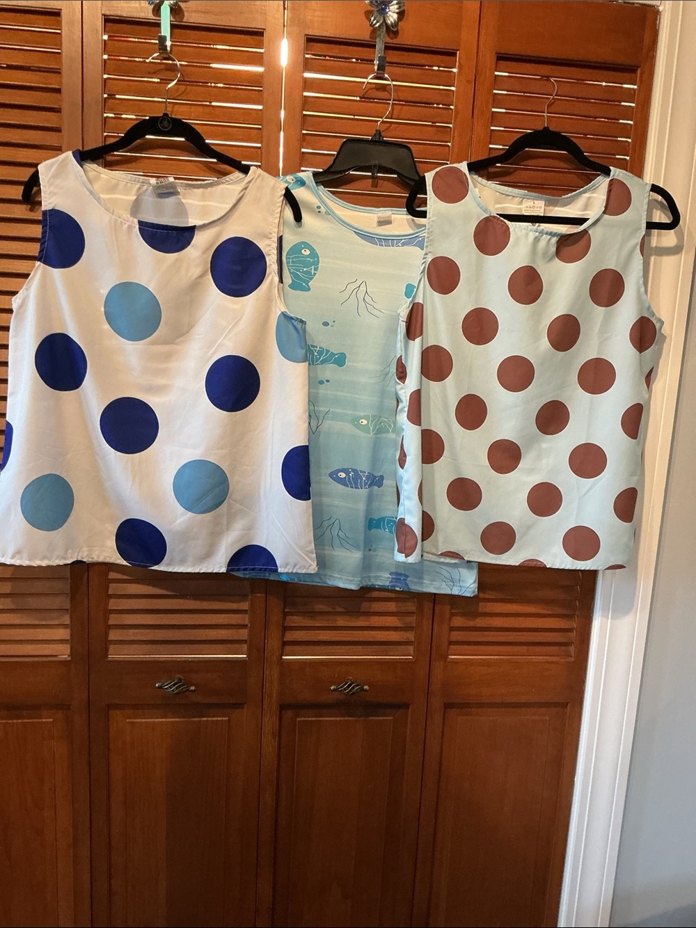 Amazon 3 Ladies sleeveless multi-color tops